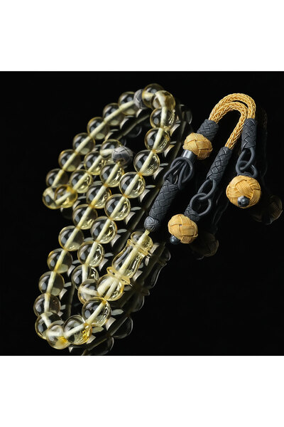 İnan Tesbih تصميم كازازي مسبحة كهرمانية اللون شفافة