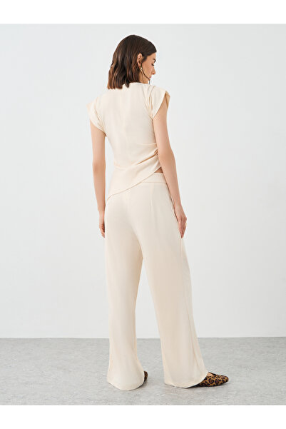 Styli Beige Asymmetric Hem Top and Wide Leg Pants Co-Ords