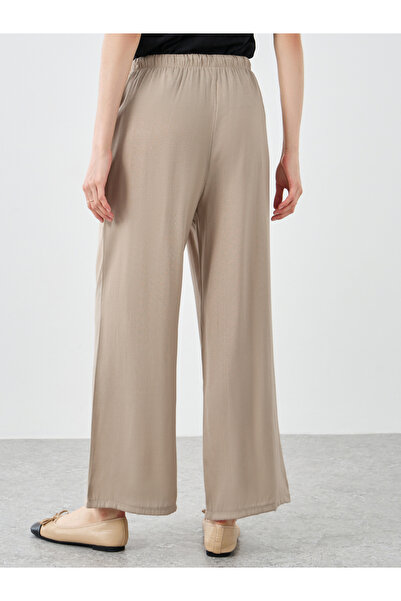 Styli Beige Solid Drawstring Waist Pocket Detail Pants