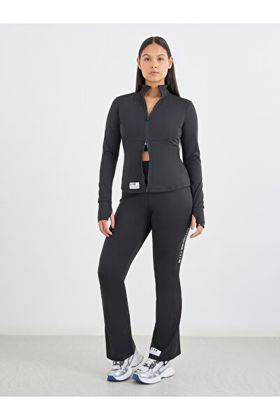 Styli إصدار Gymspire - بنطال ضيق واسع من الأسفل بجيوب جانبية وخصر عريض مع تفاصيل نصية