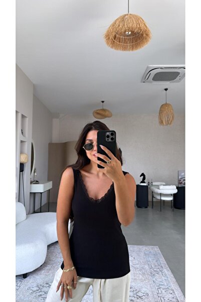 Buket Teke قميص داخلي من الدانتيل الأسود