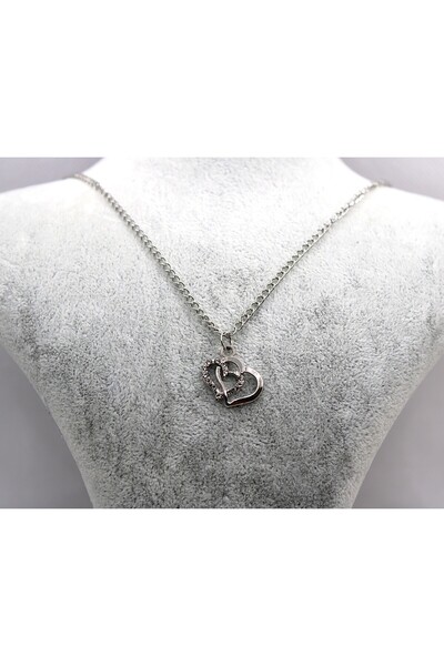 Tezcan Aksesuar قلادة من الفولاذ على شكل قلب مرصع بالأحجار