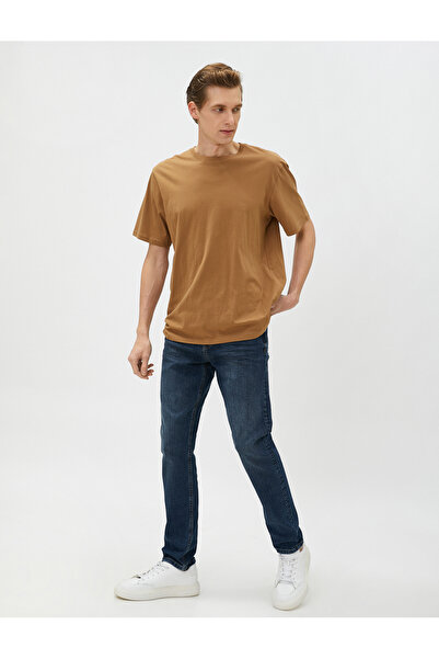 Koton بنطلون جينز براد سليم فيت للرجال باللون الأزرق الداكن