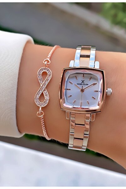 Daniel Klein ساعة يد نسائية من العلامة التجارية روز فضية اللون مربعة الشكل وحزام رفيع - مع هدية سوار