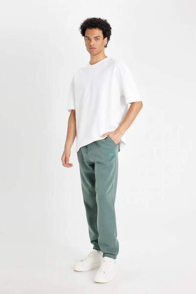 DeFacto بنطال رياضي بقصة عادية وجيب وخصر مطاطي X8286AZ23AU