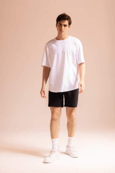 DeFacto Slim Fit Dar Kesim Kısa Paça Cepli Basic Düz Şort X5215AZ22SM