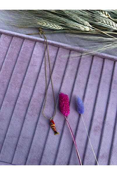 Mutenaura قلادة على شكل سمكة متأرجحة من الفولاذ