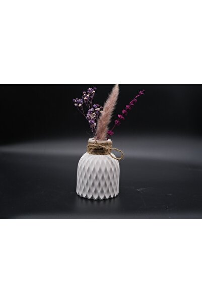 white decorative wave motif vase