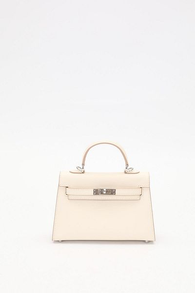 Levidor Cream Rotate Lock Handbag
