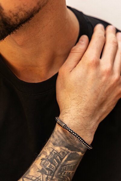 Caï Náramek pro dospělé v černé barvě