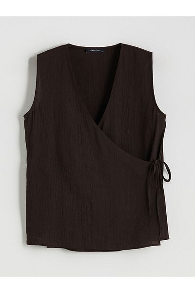 LC Waikiki Quality Parts from Celebi Store |   Double Breasted Collar Textured Blouse