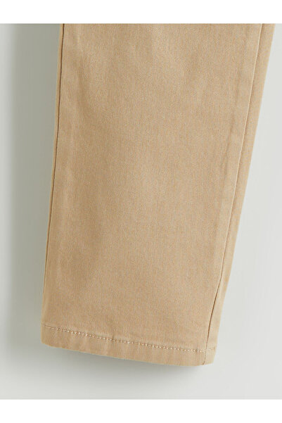 LC Waikiki بنطلون مدرسي للأولاد بلون بيج مع خصر مطاطي