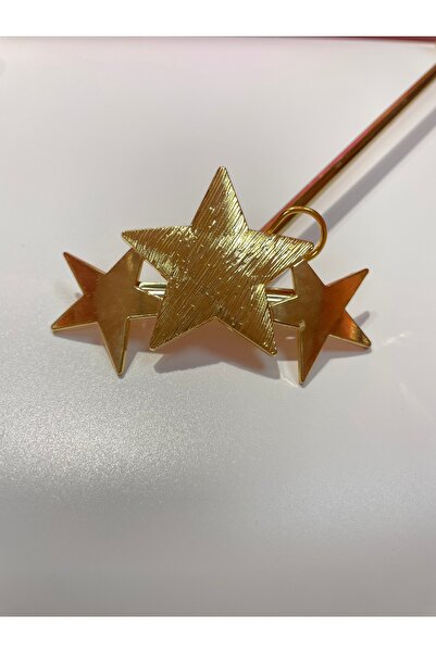 La She Accessories مشبك أوتوماتيكي ذهبي اللون مع تفاصيل النجمة