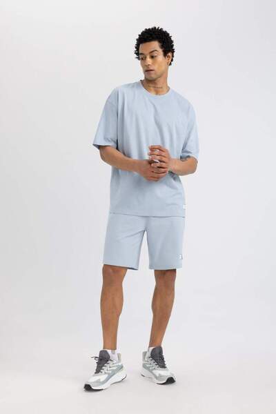 DeFacto DeFactoFit Slim Fit Dar Kesim Kısa Paça Sweatshirt Kumaşı Şort A1625AX24SM