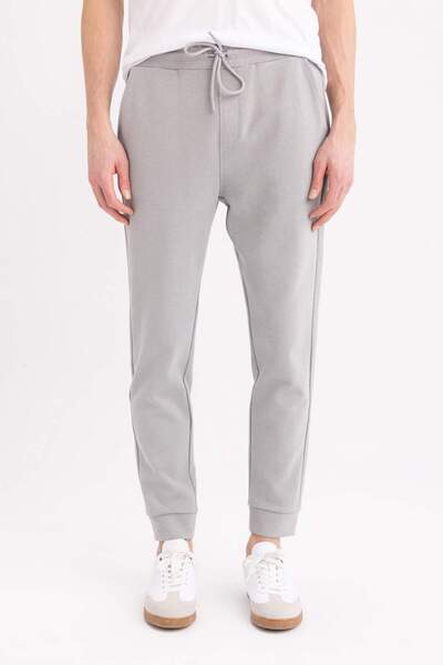 DeFacto Λεπτό Jogger Sweatpants Slim Fit Slim Fit με κορδόνια στη μέση και ελαστικό πόδι με τσέπες B4545AX24SP