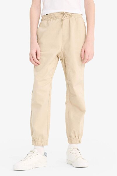 DeFacto Erkek Çocuk Beli Bağcıklı Cepli Lastikli Paça Jogger Basic Düz Pantolon 24y801002984