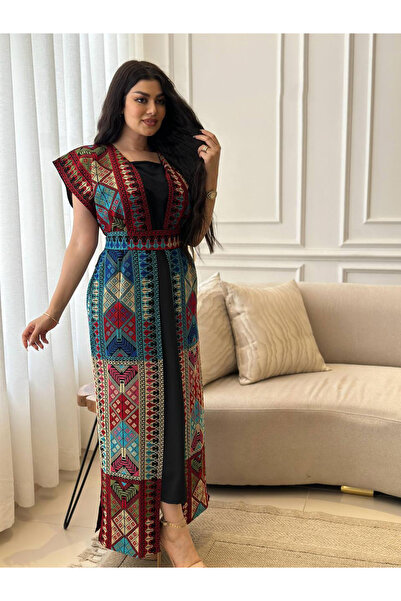 Lyaly aljlabyh The "Mosaic Masterpiece" jalabiya is an elegant black dress wi...