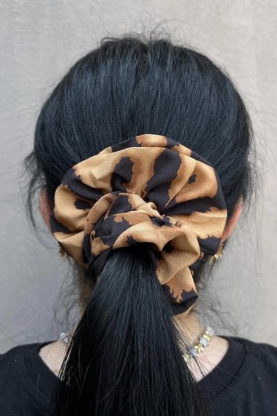 Mutenaura Leopard Patterned Bagel Buckle