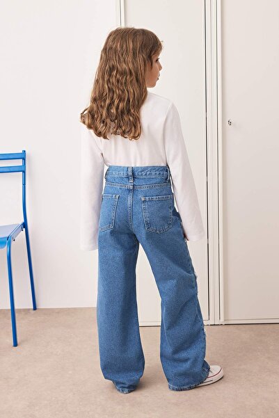 TRENDYOLKIDS Modré geometrické bavlněné džínové kalhoty TKDAW25PL00001