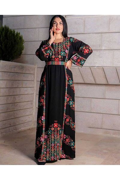 Lyaly aljlabyh "Flower Garden" Jalabiya: An elegant black dress with colorful floral embroidery covering the edges and waist, for a vibrant, feminine look.