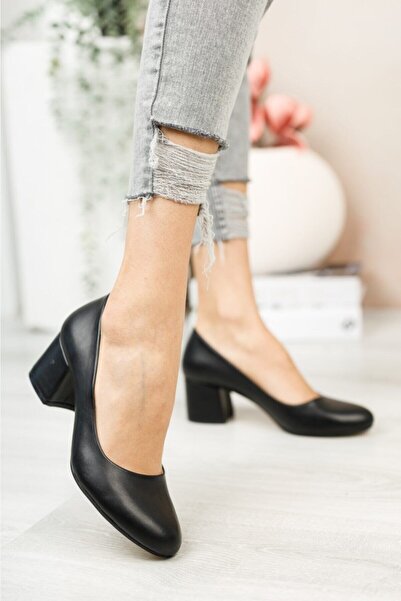 Nirvana Γυναικείο μαύρο δέρμα στρογγυλό σχέδιο