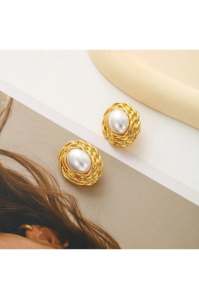 Eva Grace Gillian gold clip earrings with pearls and retro pattern