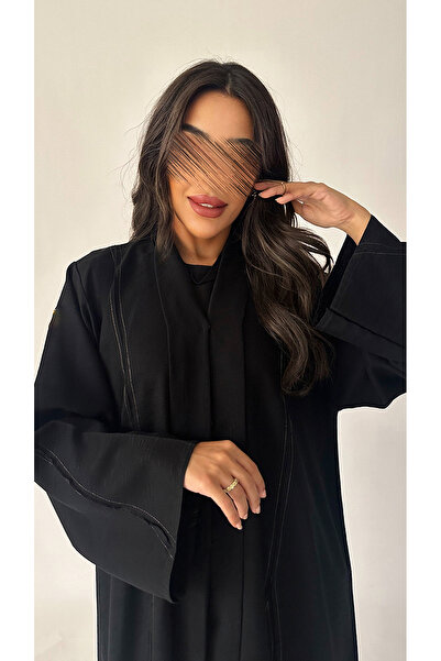 outline Cool black abaya with wide sleeves and copper lines
