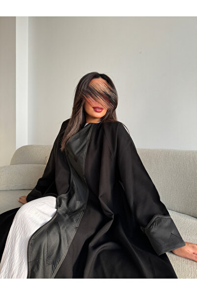 outline Elegant black abaya with a semi-circular cut