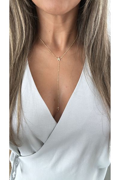Liora Long Model Gold Necklace with Star and Seahorse Detail