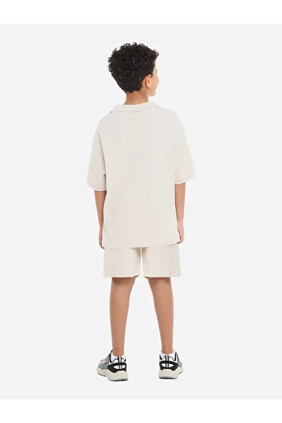 Victor and Jane By Styli Boys Textured Polo T-Shirt and Patch Detail Shorts Set