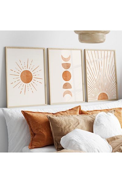 Nuqta Three canvas paintings - the sun and the phases of the moon in a simplified artistic style