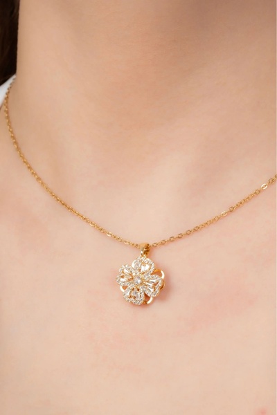 stain steel ALTIN KAPLAMA ÇELİK DÖNEN ÇİÇEK MOTİFLİ ZİRKON TAŞLI KOLYE