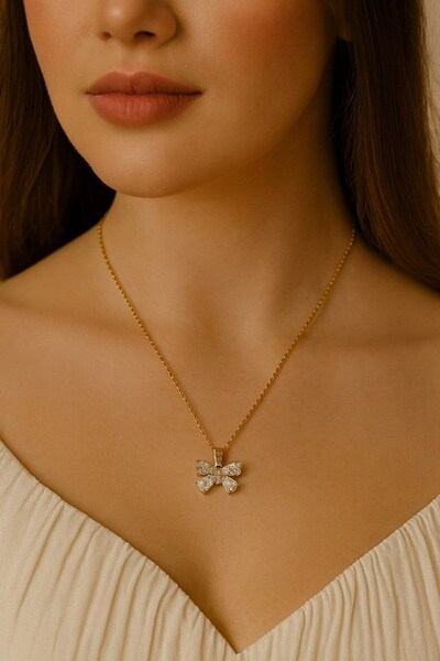 G&CARAV ACCESSORY قلادة على شكل فيونكة من الحجر