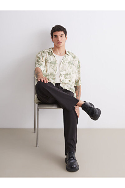 LC Waikiki Rmz Gi̇yi̇m Farkiyla Standard Fit Short Sleeve Embroidered Viscose...