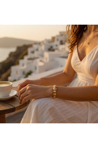 BuradaBuldun Gold Color Oval Bead Design Bracelet - Elegant and Modern