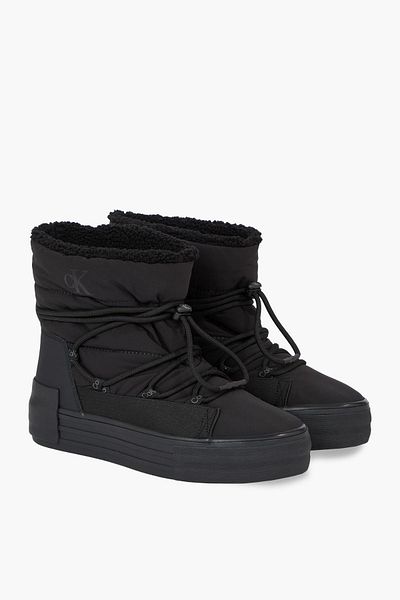 Calvin Klein Women's Brand Logo on Heel and Side, Polyster Upper, Artificial Wool Lined Rubber