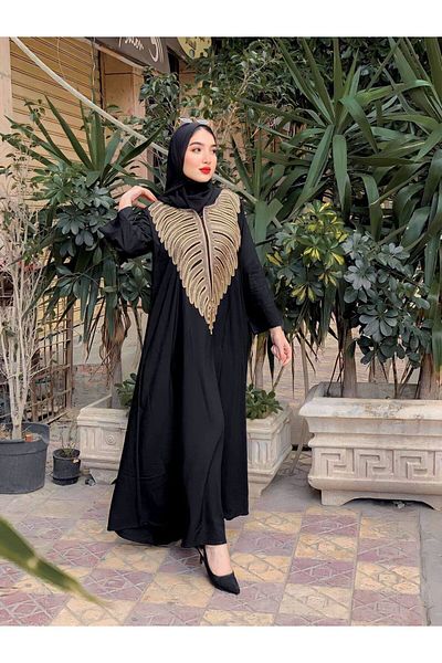 Generica Cotton abaya made of light natural cotton with a belt in the middle and wide sleeves that add a touch of elegance