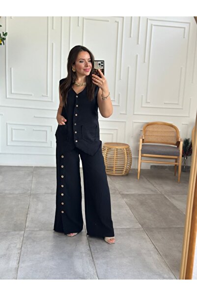 Yağmur Butik Düğme Detaylı Bol Paça Müslin Pantolon