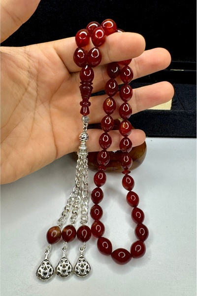 İskenderun Tesbihcilik مسبحة من مادة Ferdi Güven ذات اللون البرتقالي المضغوط