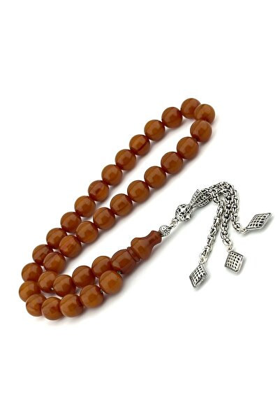 Tasarım مادة مصممة لتجعيد العنبر