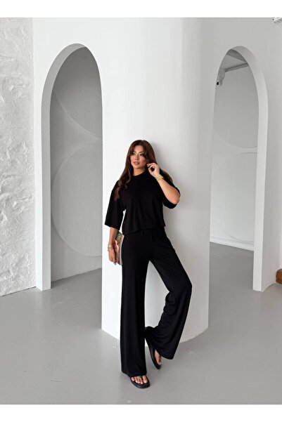 edz moda moda ve tarzın buluştuğu nokta Γυναικείο σετ φόρμας από μαύρο ύφασμα...