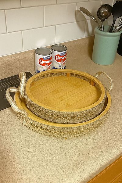MOSTAFA Set of 2 round wooden trays with porcelain edges and a porcelain handle for serving food