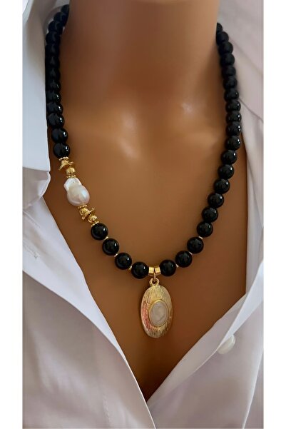 Nevaa Still قلادة من الأحجار الكريمة الطبيعية من اللؤلؤ الباروكي الأونيكس (الحقيقي).