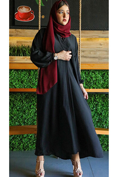 outline عباية سوداء سادة بأكمام مزمومة