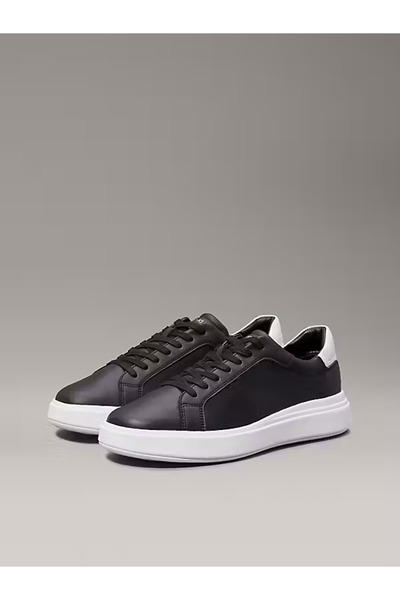Calvin Klein Herren-Markenlogo, stilvolles Leder-Sneaker in Schwarz, geeignet für den täglichen Gebrauch HM0HM0101