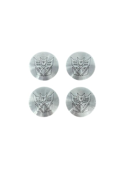 MAF Set 4 Embleme Autocolante Transformers Argintii Autoadezive Aluminiu 56mm pentru Capace de Roată
