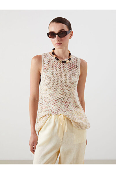 LC Waikiki بلوزة تريكو مخرمة بياقة روبا من UZG STORE للنساء الأنيقات