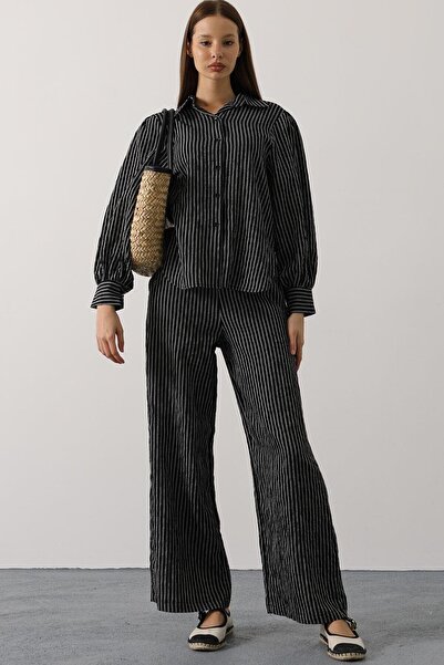 VAGGON بدلة سراويل مريحة بخط أسود للنساء Vs00579