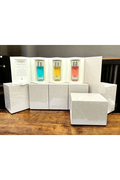 Re "ALFARIS THE DICSALIS COLLECTION" perfume set with three perfume bottles in an elegant white box decorated with...