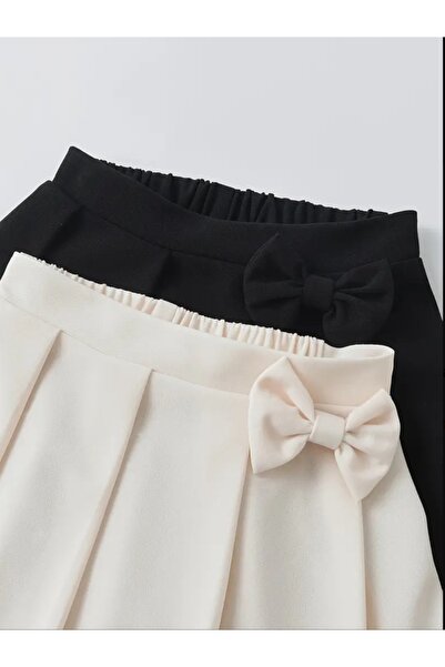 CARABO MODA Fusta mini din 2 piese pentru fetiță, cu pliuri în față și detaliu de fundă elastică în spate